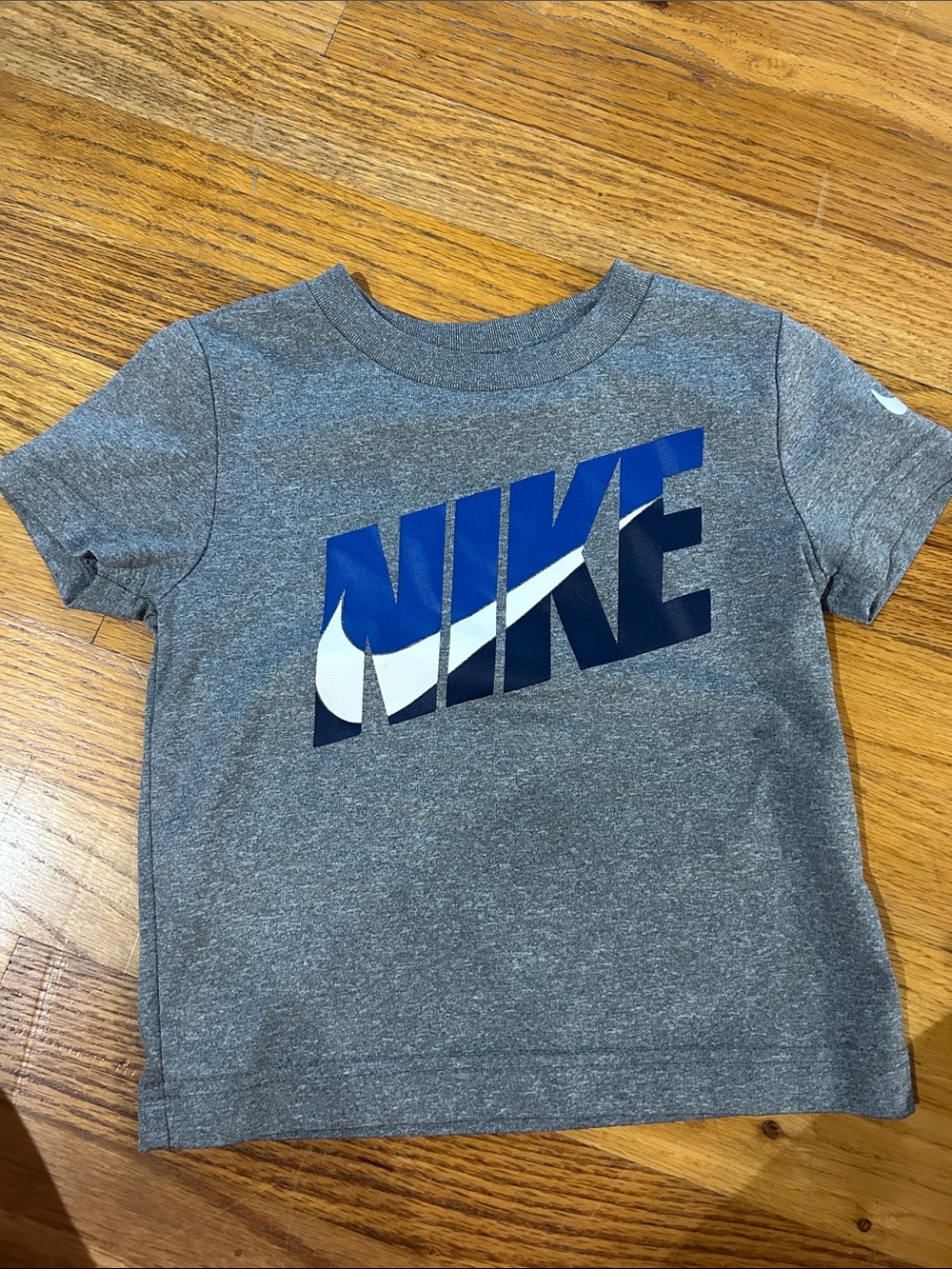 Nike Kids Gray Tee with Blue and White Logo